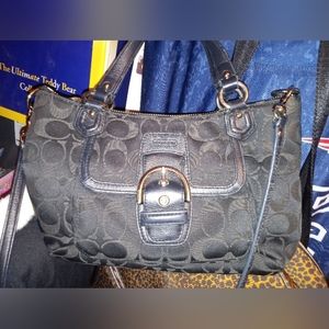 Black crossbody coach bag(were on handles)